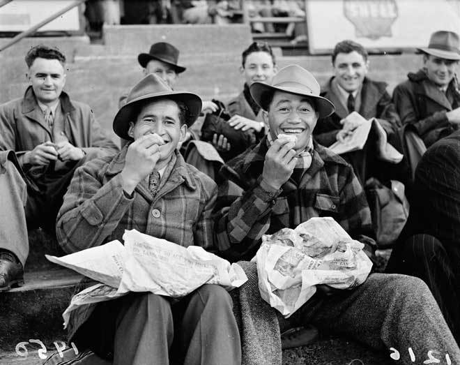 Blokes eating fish and chips